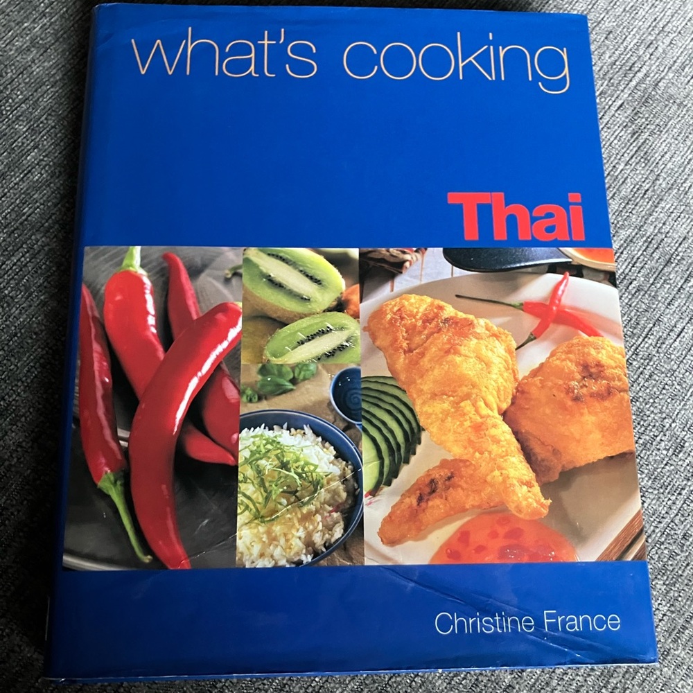 Gently used hard cover Thai cook book.